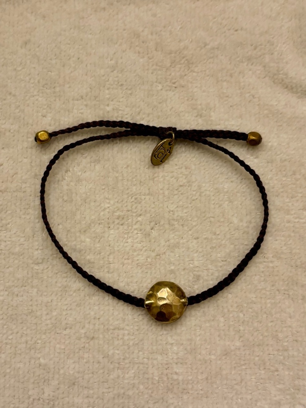 TAI Jewelry brown hand-braided cord bracelet with gold plated beads